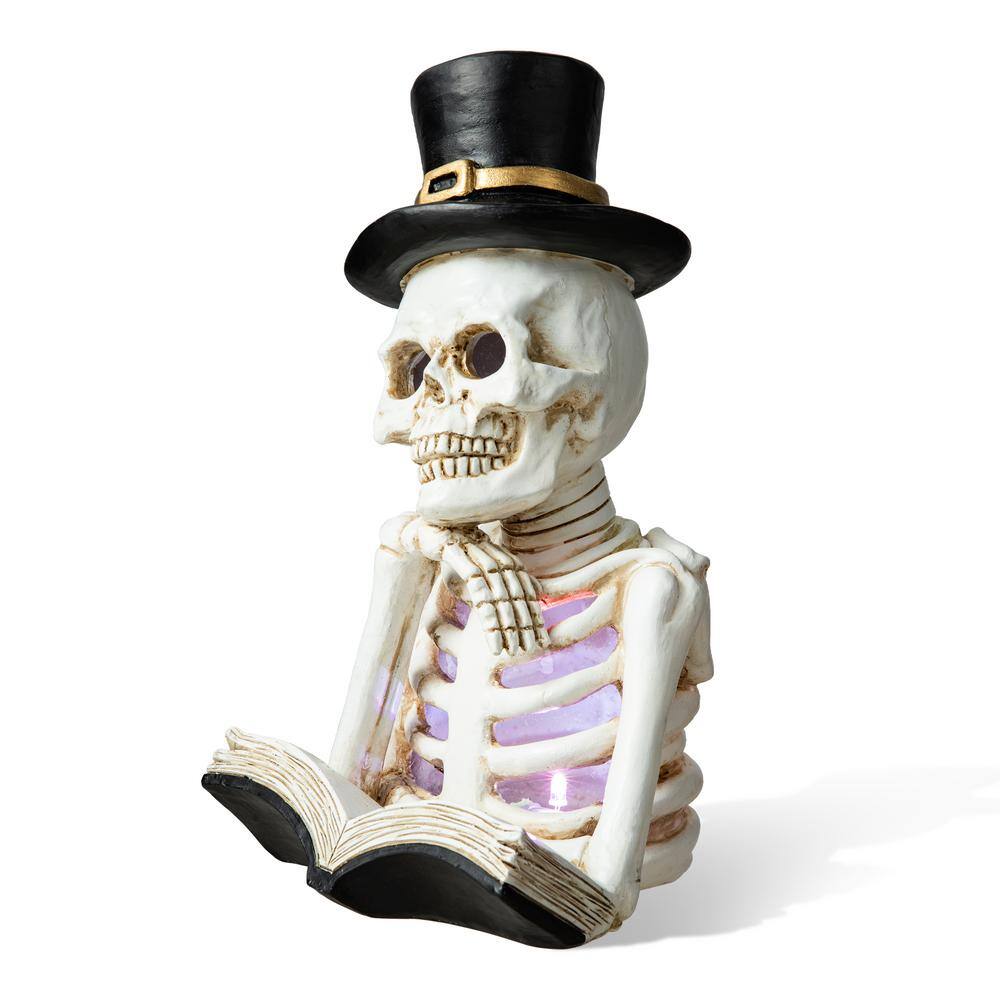 10.25 in. H Halloween Lighted Resin Skull Reading Book Table Decor - Hercitys