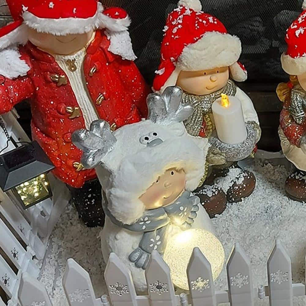 15.75 in. Smiling Child in White Snow Suit Holding LED Lighted Snowball Christmas - Hercitys