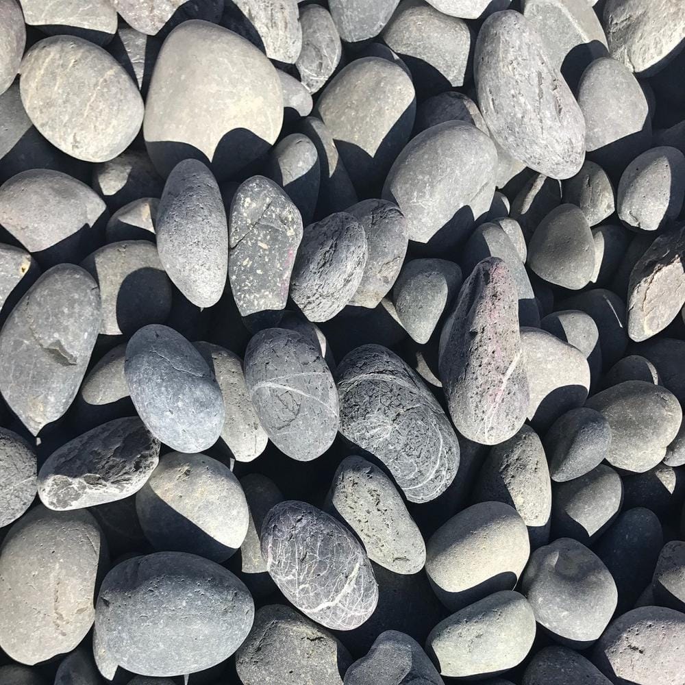 0.50 cu. ft. 40 lbs. 1 in. to 3 in. Medium Black Mexican Beach Pebble - Hercitys