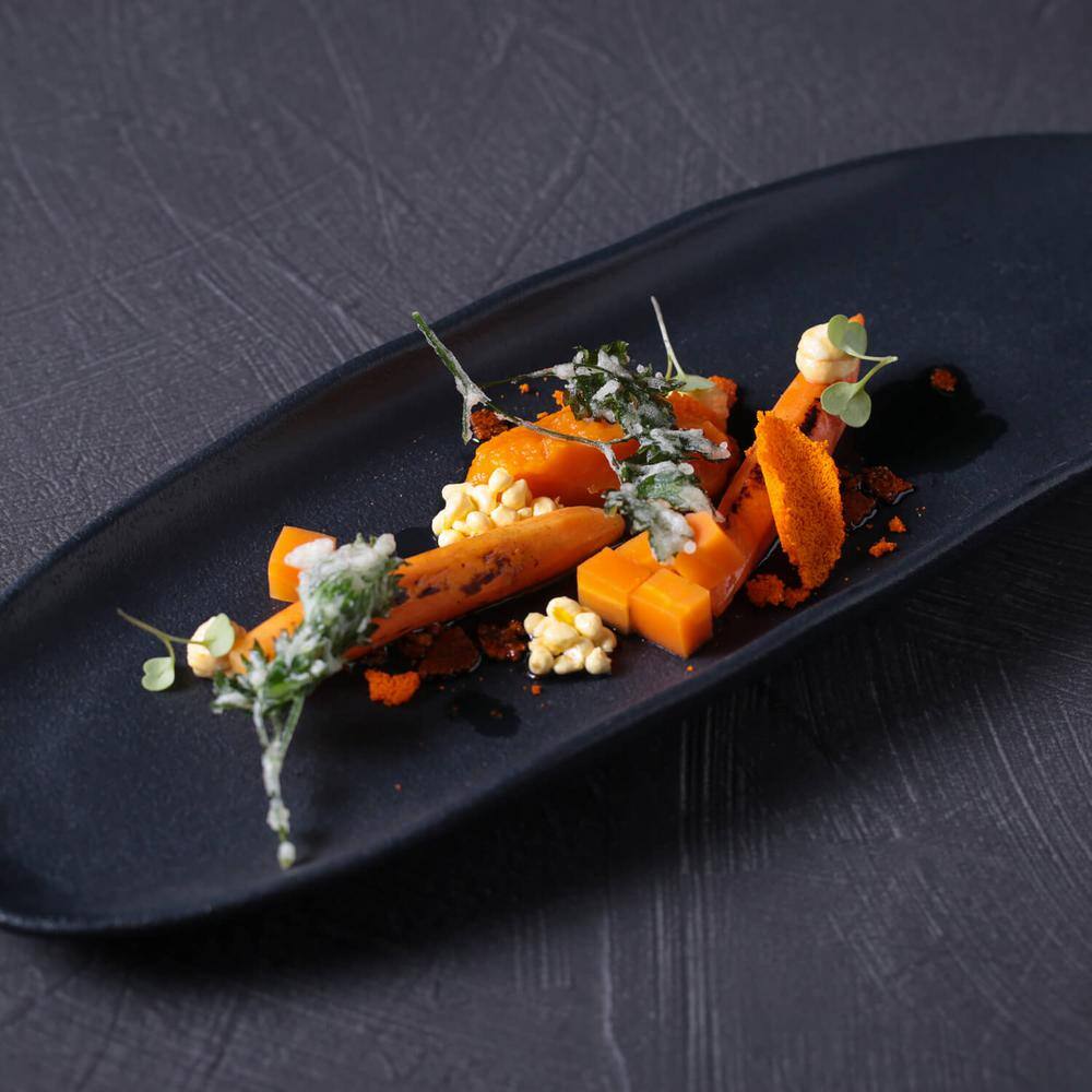 14.17 in. Matte Black Stoneware Shallow Oval Platter Large Organic (Set of 4) - Hercitys