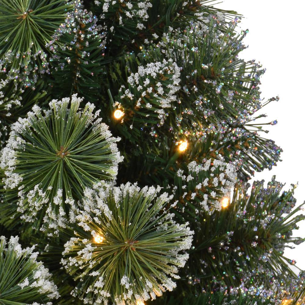 2 ft. Green Prelit Flocked Table Top Artificial Christmas Tree with 35 Lights in Tan Sac - Hercitys