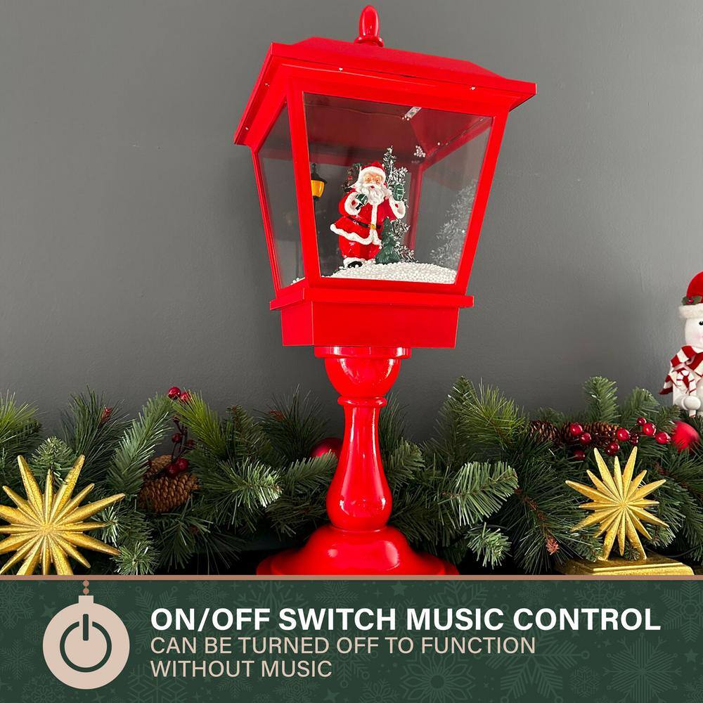 25 in. Musical Tabletop Lantern in Red Featuring Santa Scene and Snow Function - Hercitys