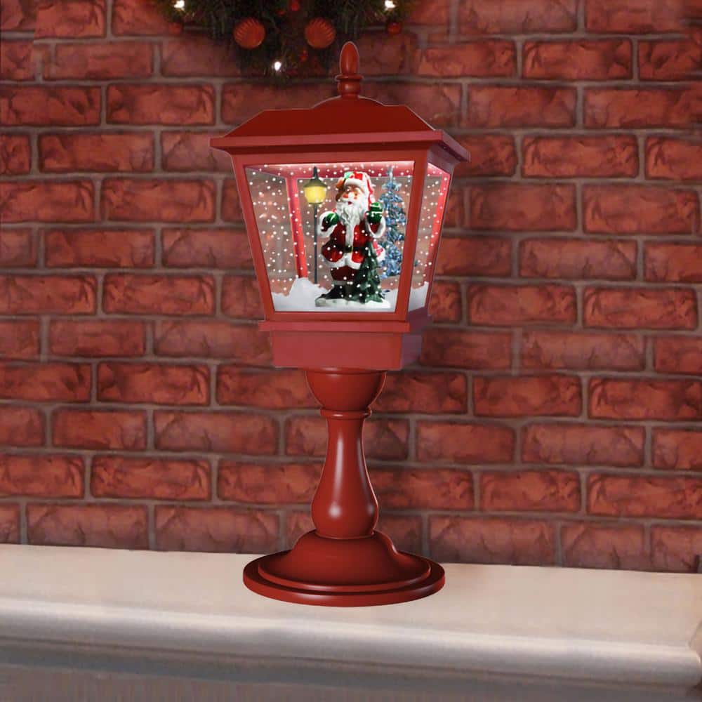 25 in. Musical Tabletop Lantern in Red Featuring Santa Scene and Snow Function - Hercitys