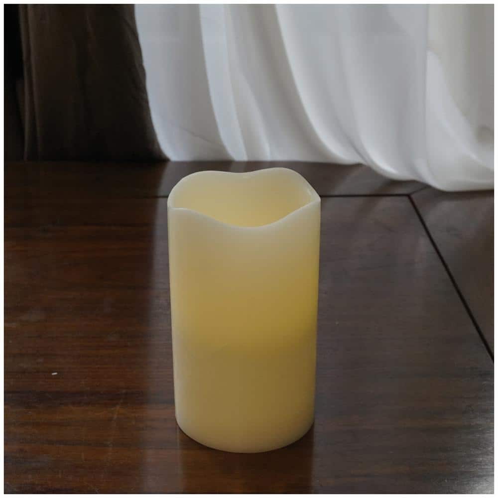 4 in. x 6.75 in. Ivory Flameless Wax Candle - Hercitys