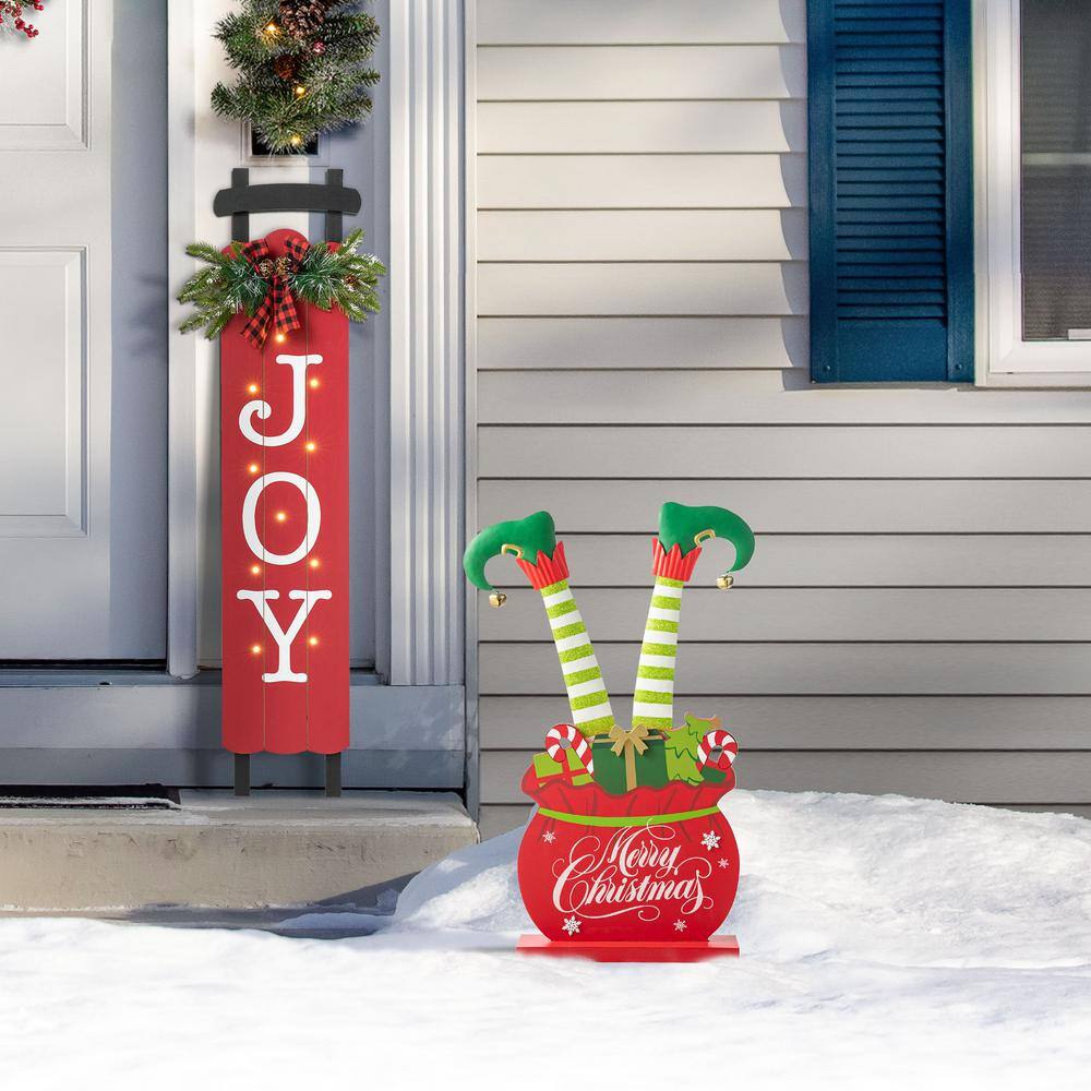 24.5 in. H Christmas Wooden/Metal Elf Legs in Gift Box Porch Decor (KD) - Hercitys