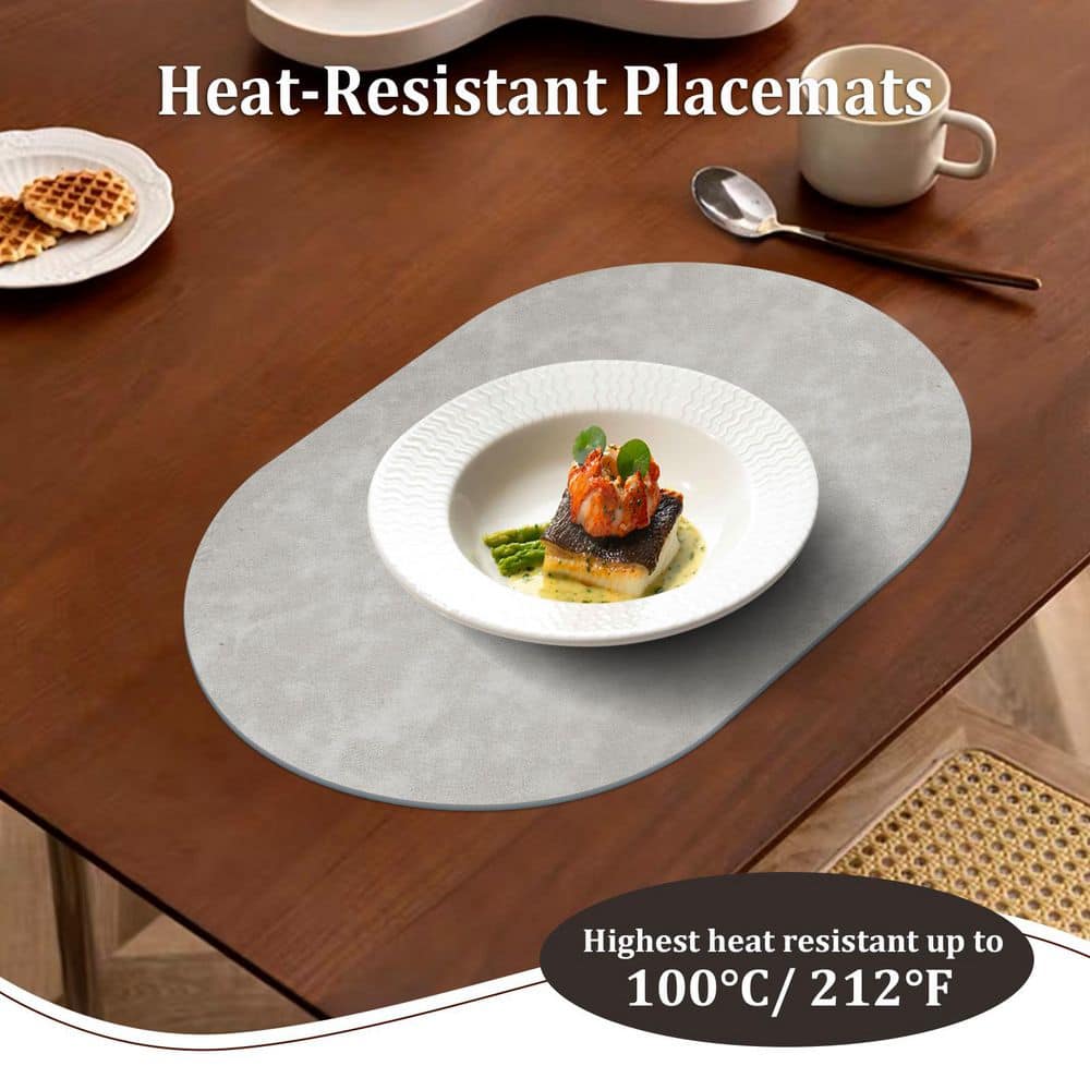 11.8 in. W x 17.5 in. H Light Grey Oval Leather Heat Resistant Placemats Set of 4 - Hercitys