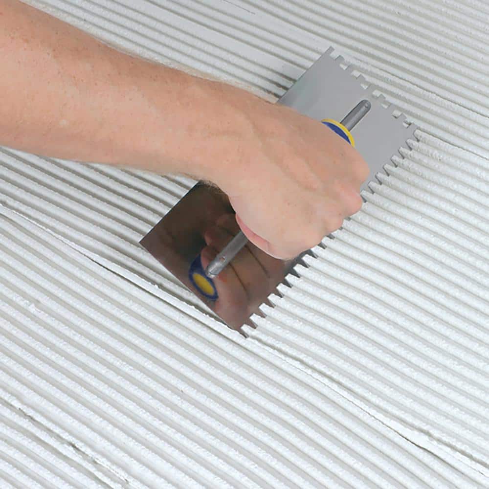 1/4 in. x 3/8 in. x 1/4 in. Comfort Grip Stainless Steel Square-Notch Flooring Trowel - Hercitys