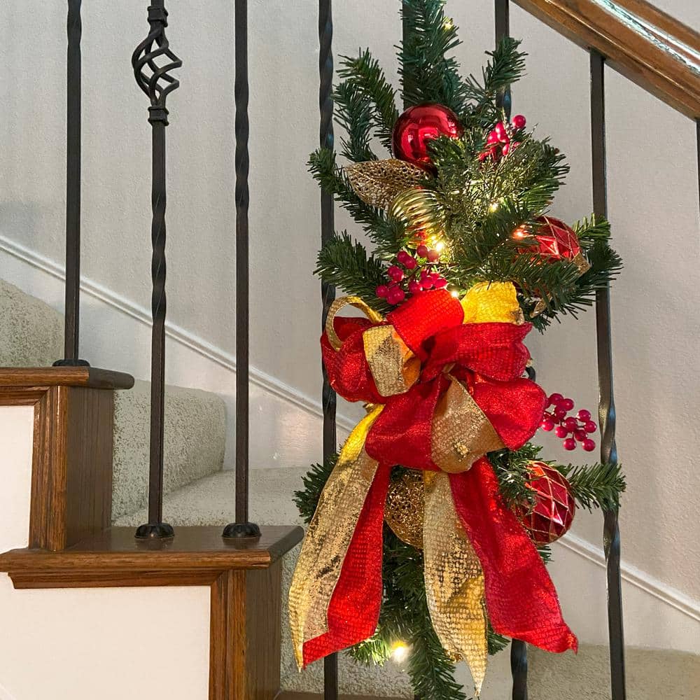 26 in. Battery Operated Pre-Lit LED Artificial Madison Staircase Swag with Red and Gold Bow - Hercitys